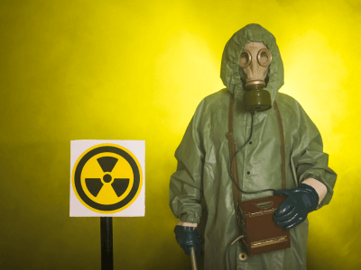 hazmat suit and warning